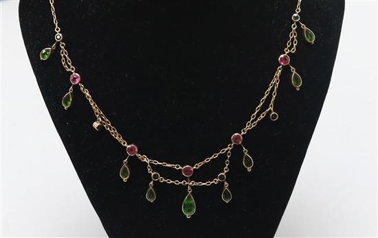 A late Victorian 9ct gold and coloured paste set drop fringe necklace, 54cm.